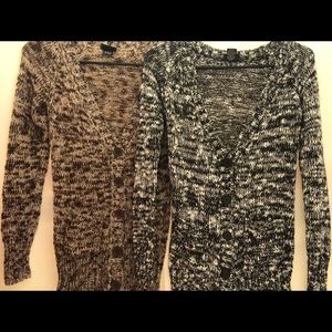 Black/white and brown/white long sleeve sweater.